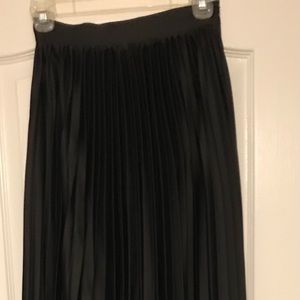 Black silk pleated maxi skirt.